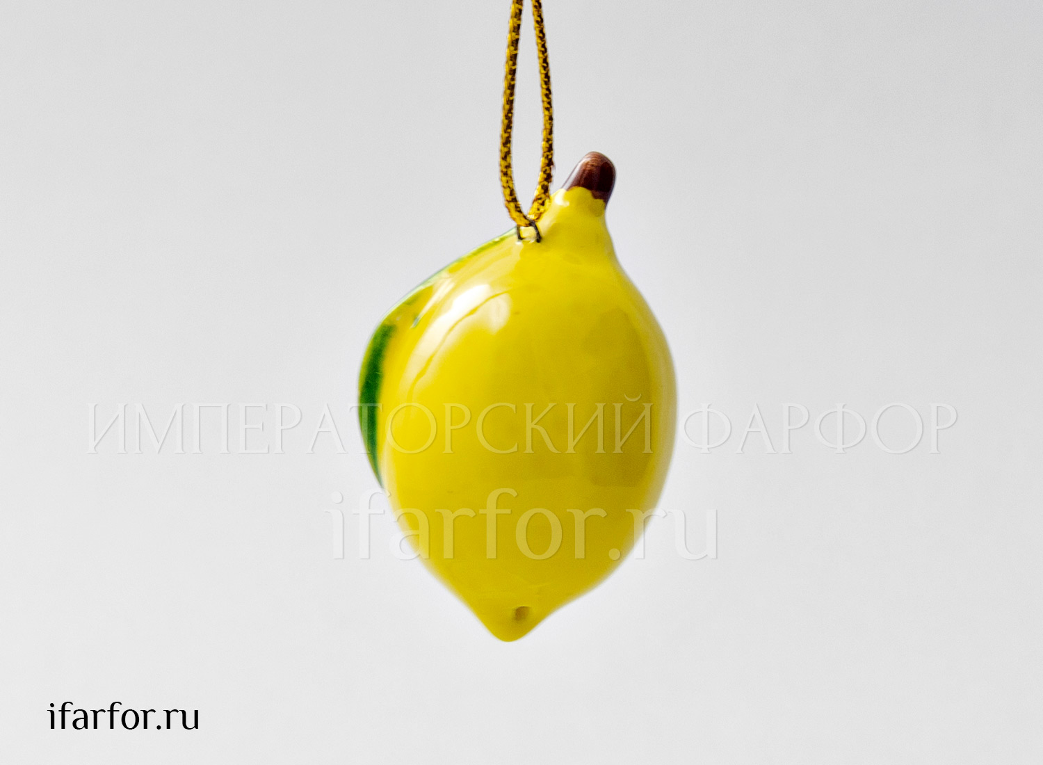 Елочная игрушка «Лимон мини» Форма: Лимон мини. Майолика. 35 x 55 мм.