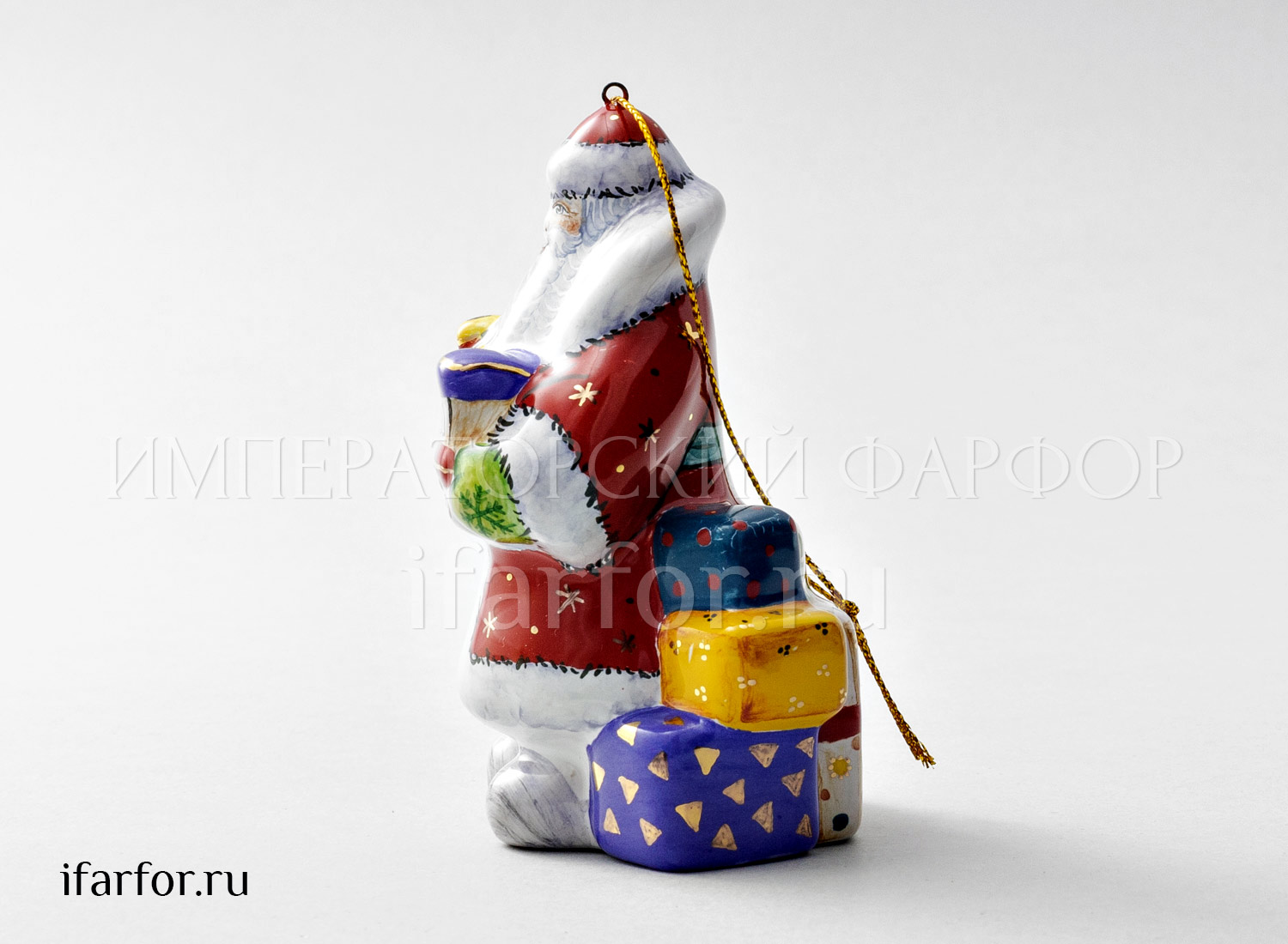 Елочная игрушка «Дед мороз с паровозиком» Форма: Дед мороз с паровозиком. Майолика. 60 x 70 x 105 мм.