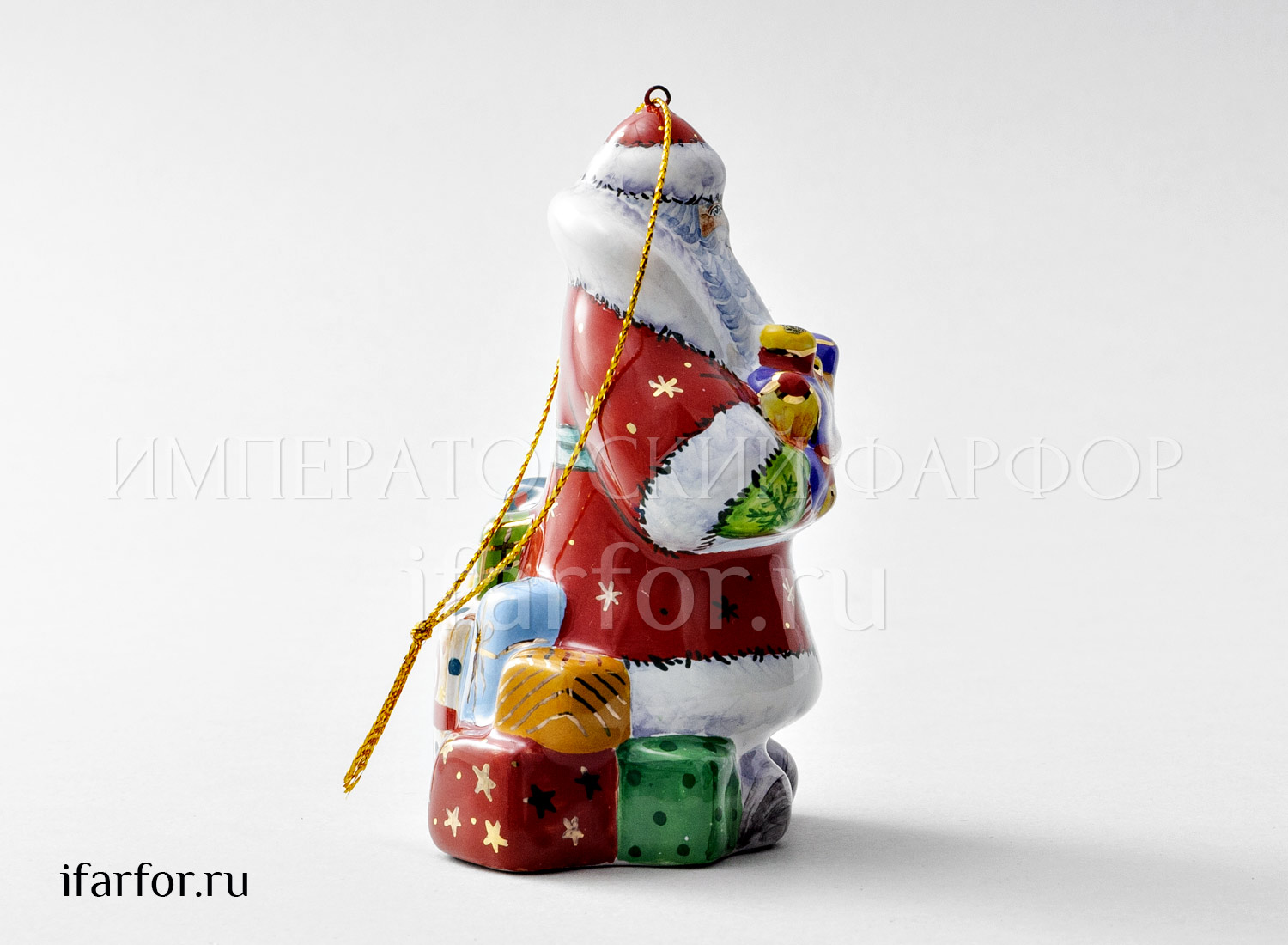 Елочная игрушка «Дед мороз с паровозиком» Форма: Дед мороз с паровозиком. Майолика. 60 x 70 x 105 мм.
