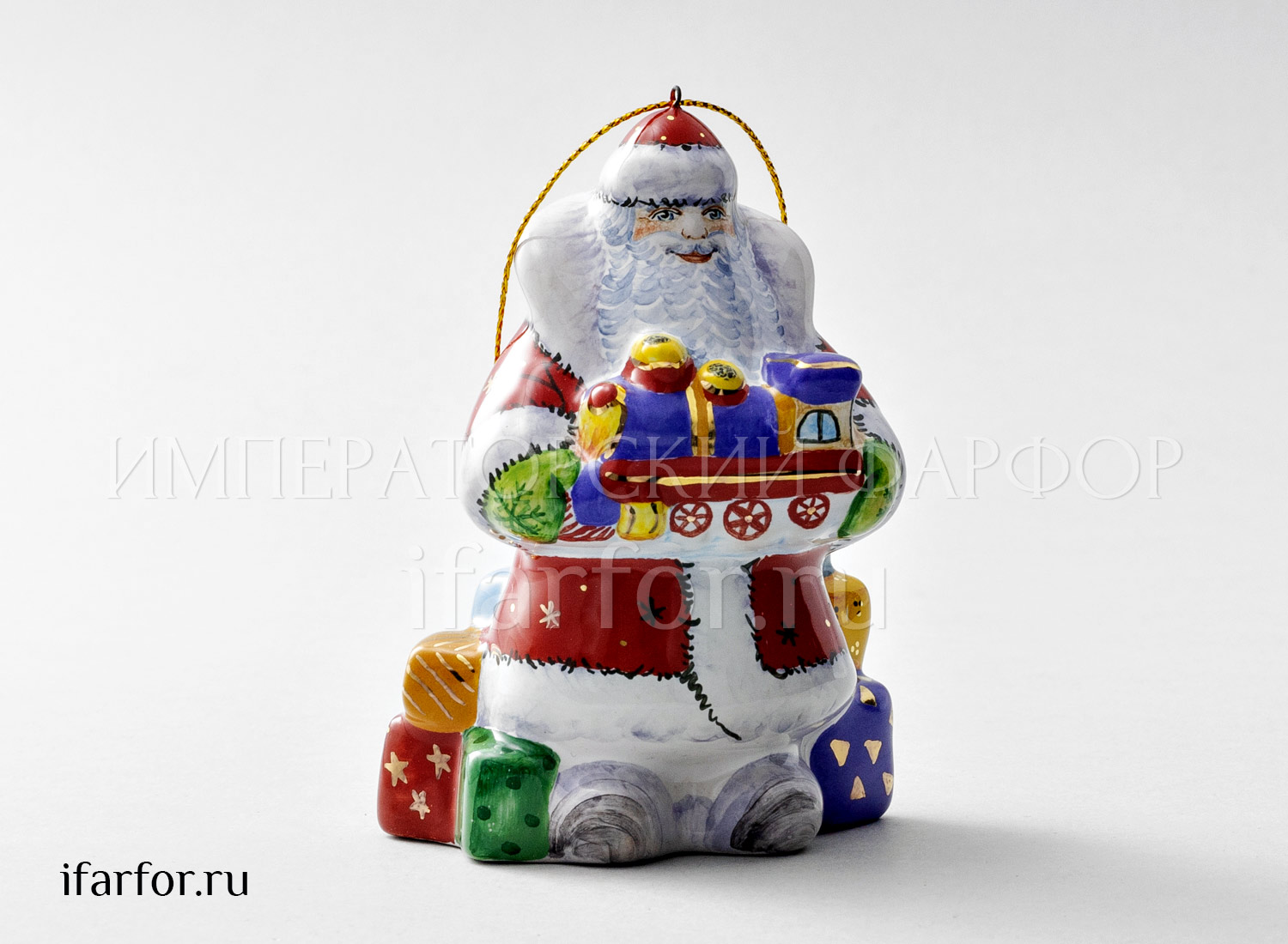 Елочная игрушка «Дед мороз с паровозиком» Форма: Дед мороз с паровозиком. Майолика. 60 x 70 x 105 мм.