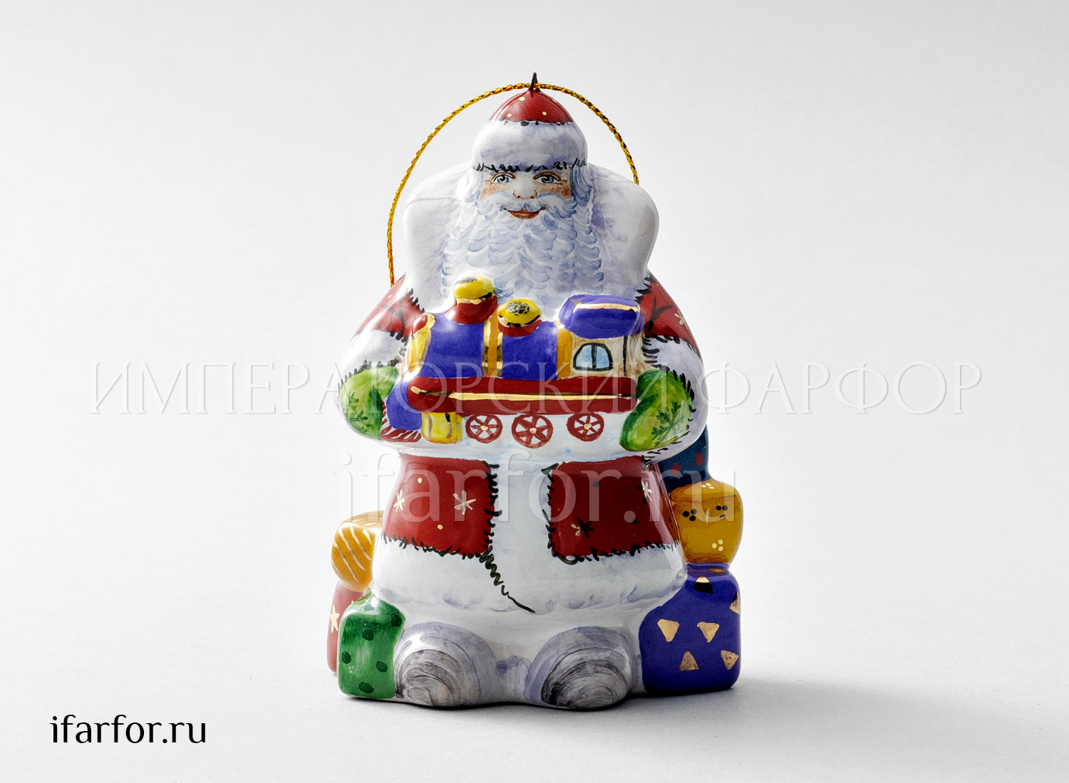 Елочная игрушка «Дед мороз с паровозиком» Форма: Дед мороз с паровозиком. Майолика. 60 x 70 x 105 мм.