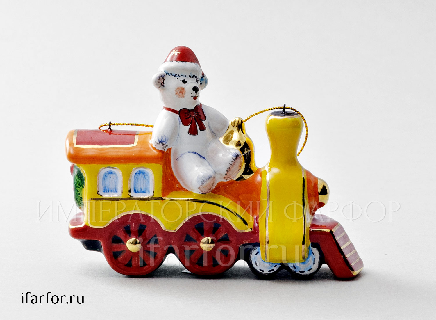 Елочная игрушка «Паровозик с мишкой» Форма: Паровозик с мишкой. Майолика. 114 x 38 x 90 мм.