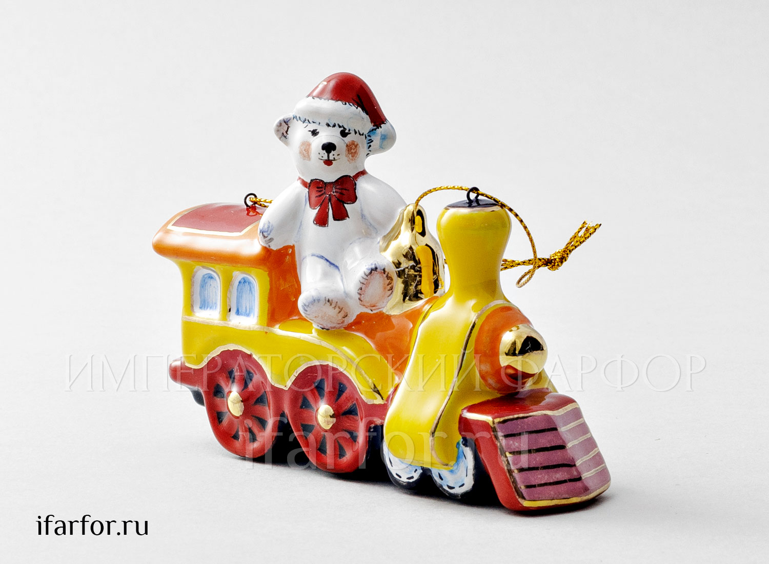 Елочная игрушка «Паровозик с мишкой» Форма: Паровозик с мишкой. Майолика. 114 x 38 x 90 мм.