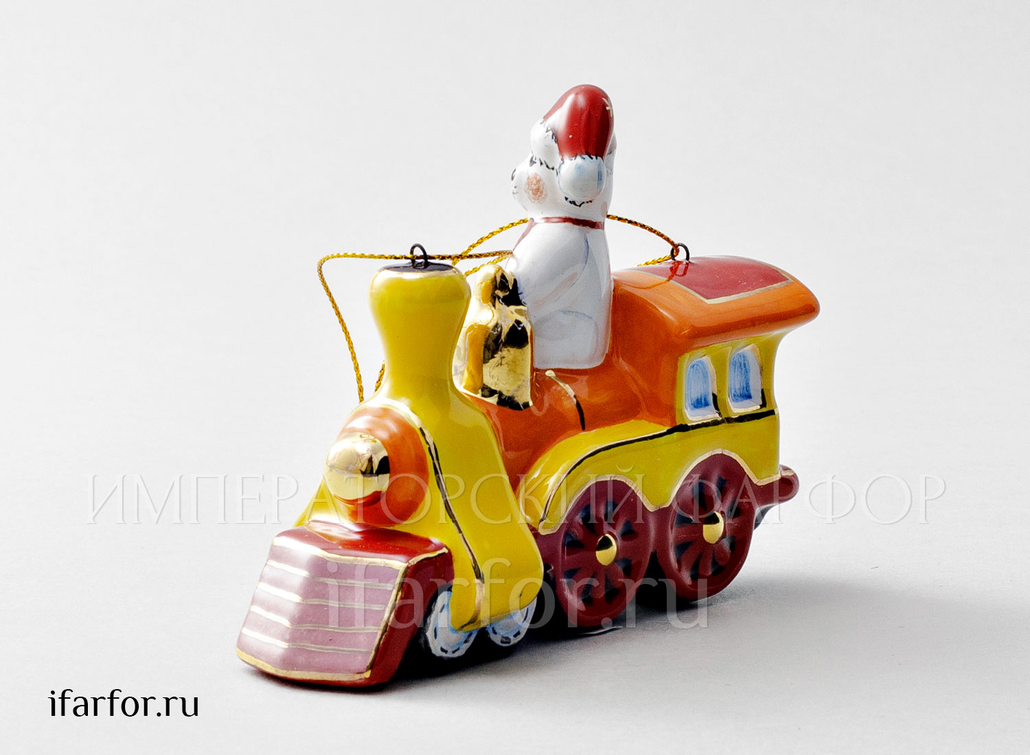 Елочная игрушка «Паровозик с мишкой» Форма: Паровозик с мишкой. Майолика. 114 x 38 x 90 мм.