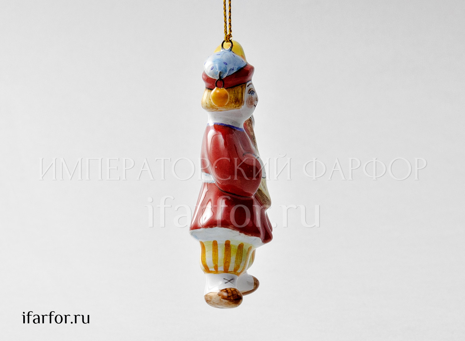 Елочная игрушка «Скоморох с балалайкой» Форма: Скоморох с балалайкой. Майолика. 55 x 80 мм.