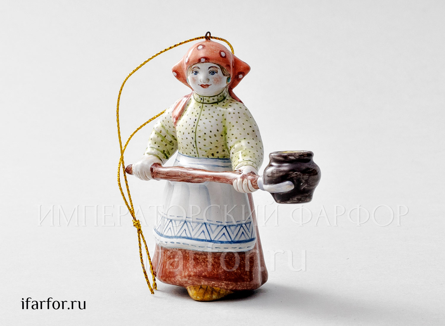 Елочная игрушка «Хозяюшка с ухватом» Форма: Хозяюшка с ухватом. Майолика. 90 x 95 мм.