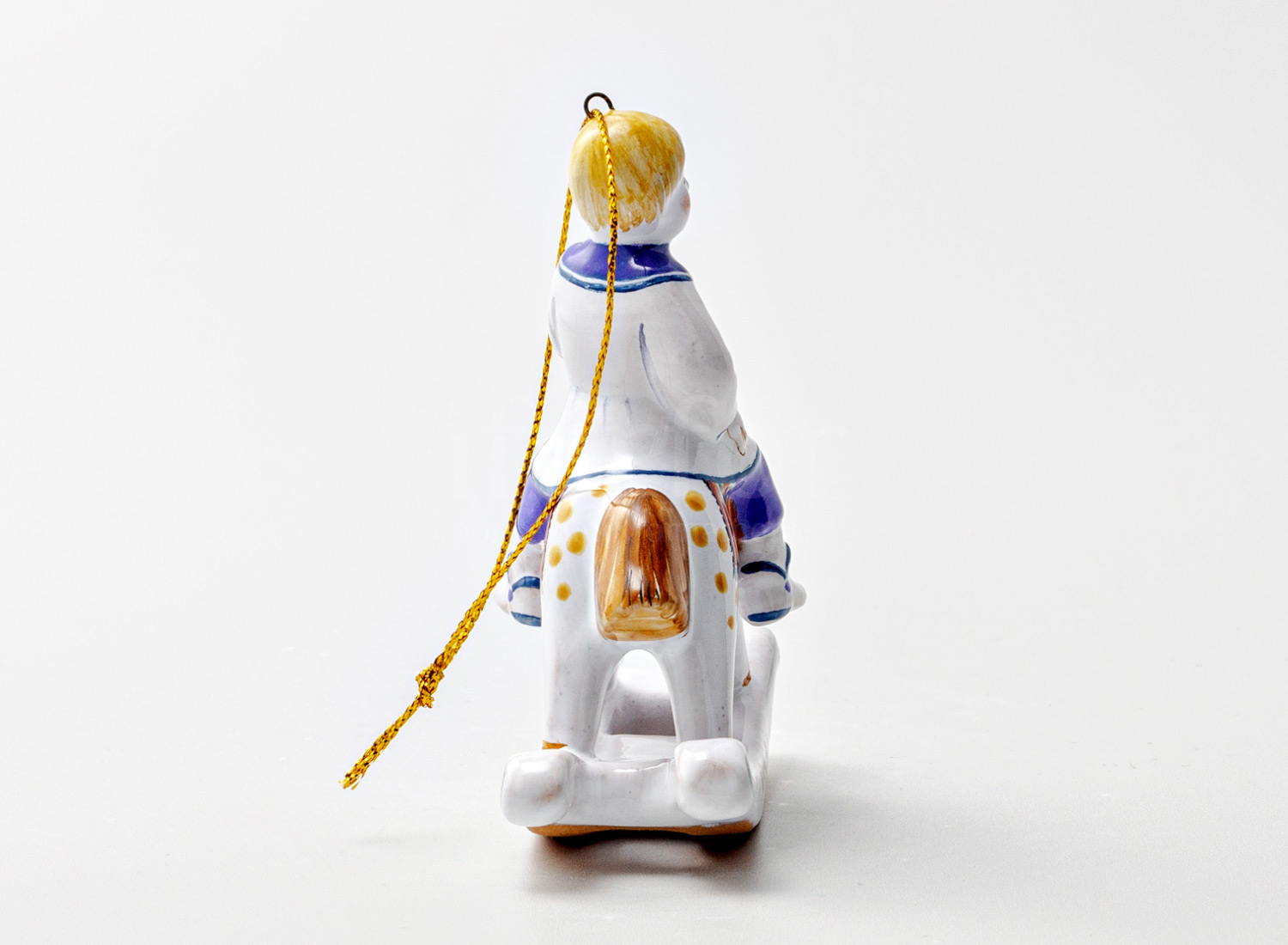 Елочная игрушка «Мальчик на лошадке» Форма: Мальчик на лошадке. Майолика. 85 x 95 мм.