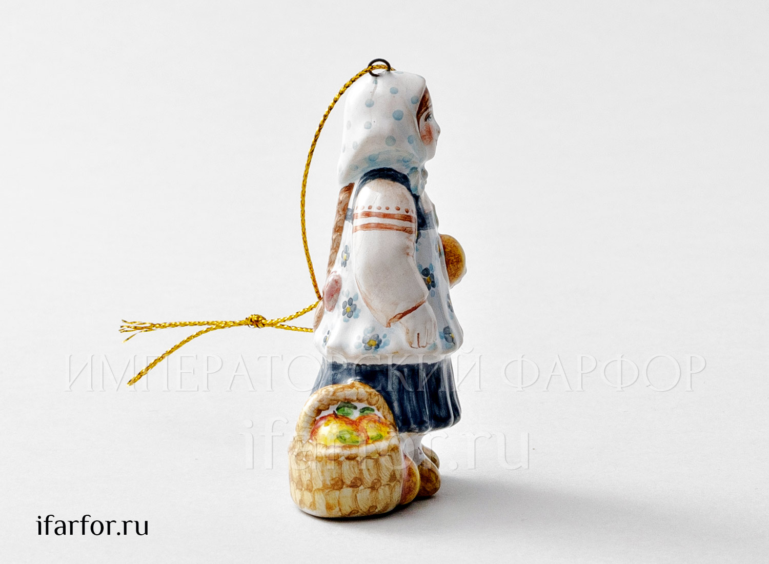 Елочная игрушка «Девочка с яблоками» Форма: Девочка с яблоками. Майолика. 50 x 80 мм.