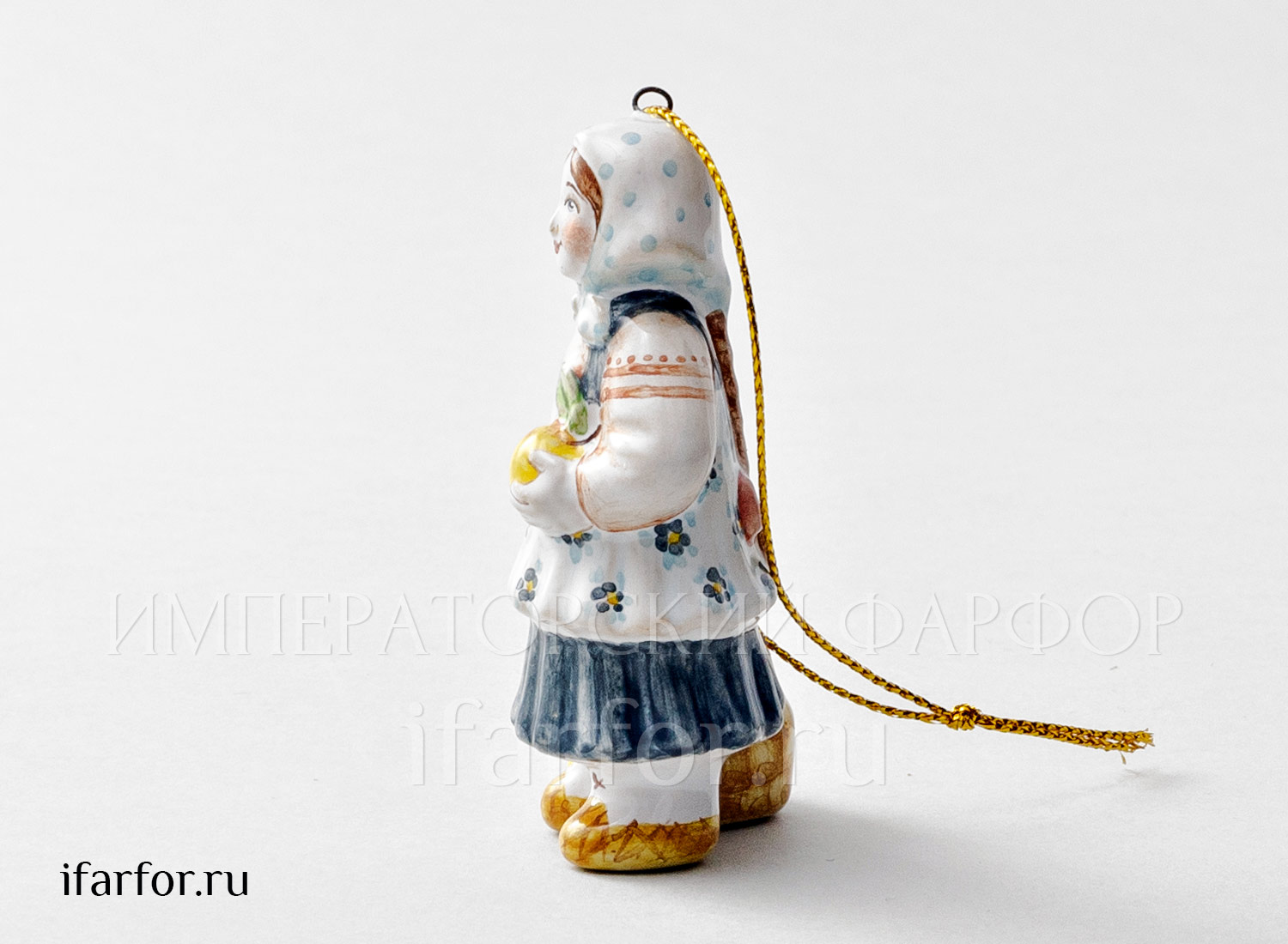 Елочная игрушка «Девочка с яблоками» Форма: Девочка с яблоками. Майолика. 50 x 80 мм.