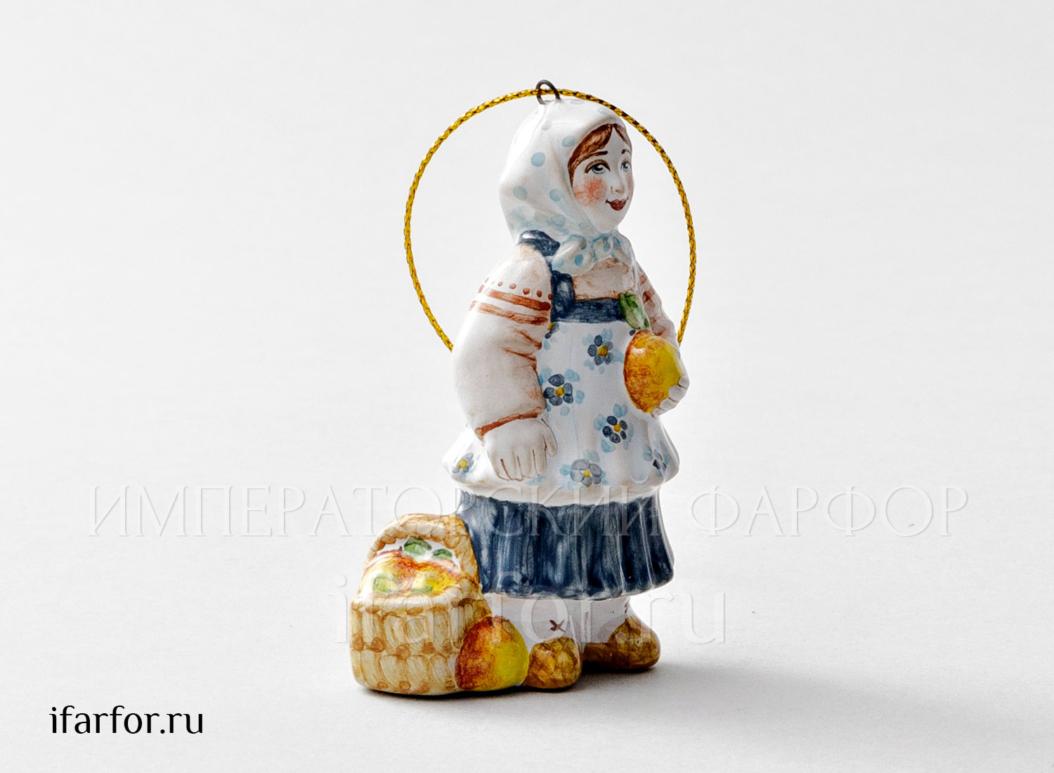 Елочная игрушка «Девочка с яблоками» Форма: Девочка с яблоками. Майолика. 50 x 80 мм.
