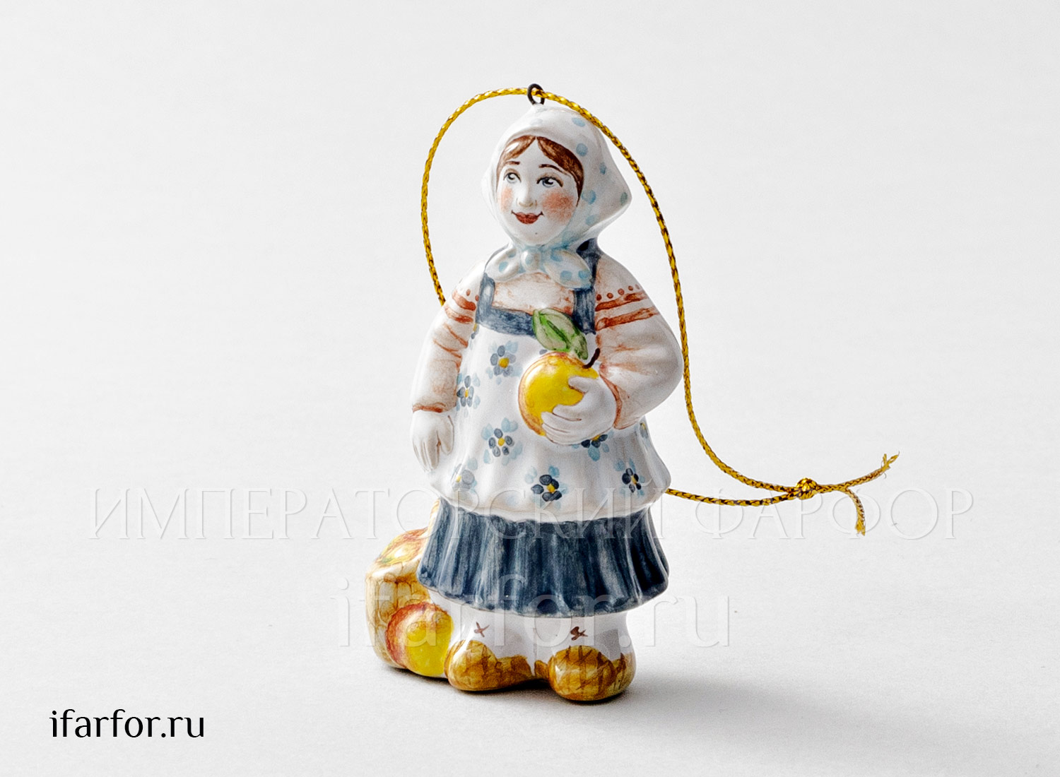 Елочная игрушка «Девочка с яблоками» Форма: Девочка с яблоками. Майолика. 50 x 80 мм.