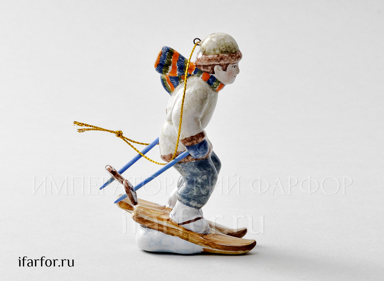 Елочная игрушка «Маленький лыжник» Форма: Маленький лыжник. Майолика. 40 x 100 мм.