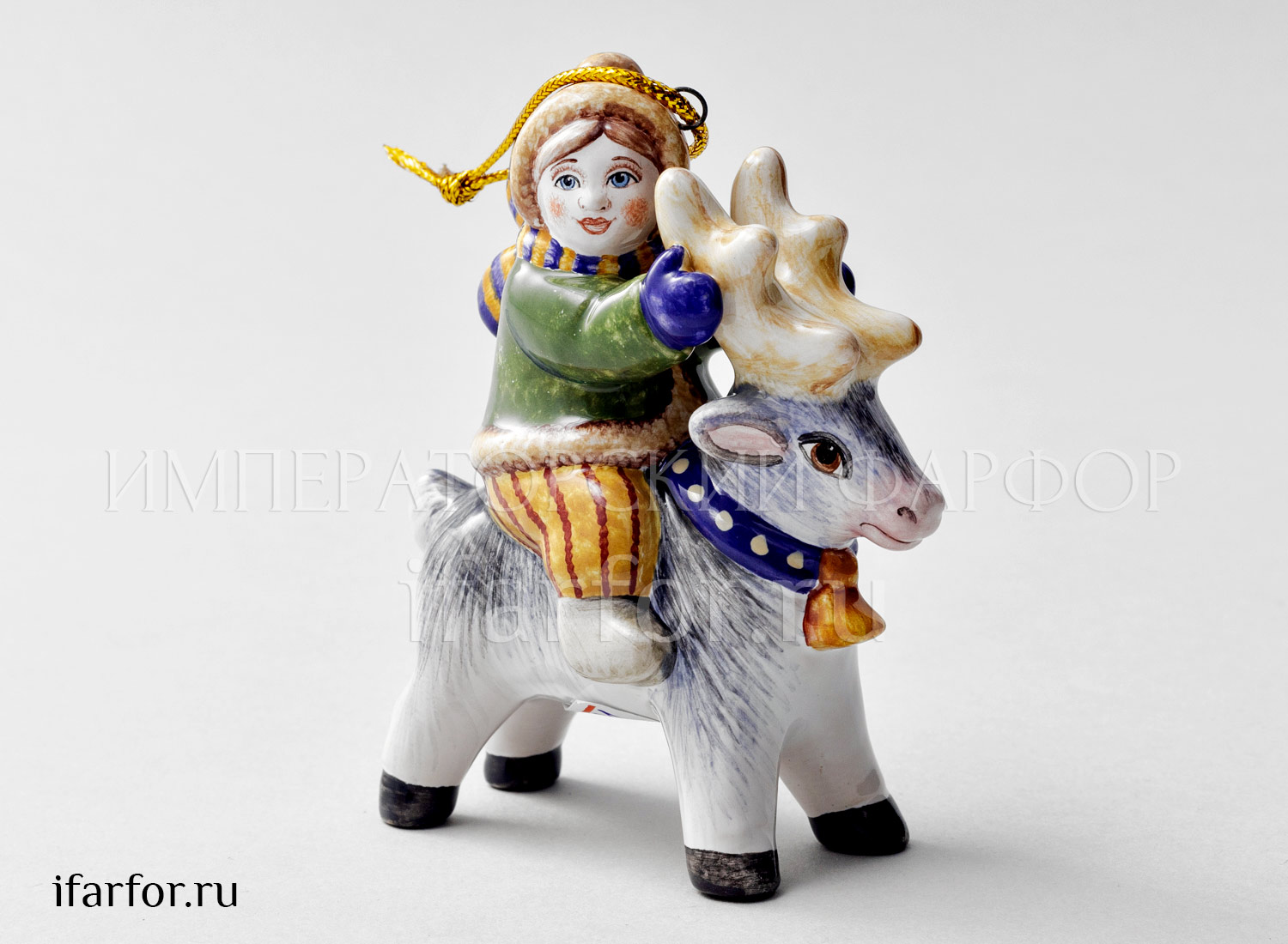 Елочная игрушка «Мальчик с шарфиком на олене» Форма: Мальчик с шарфиком на олене. Майолика. 80 x 90 мм.