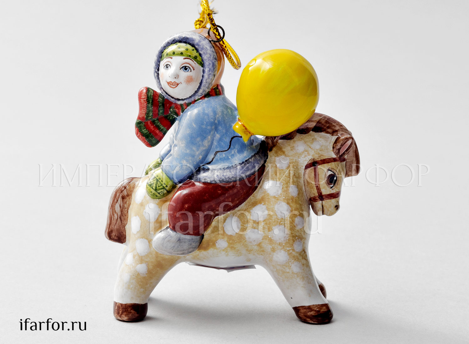 Елочная игрушка «Мальчик с шариком на лошадке» Форма: Мальчик с шариком на лошадке. Майолика. 80 x 90 мм.