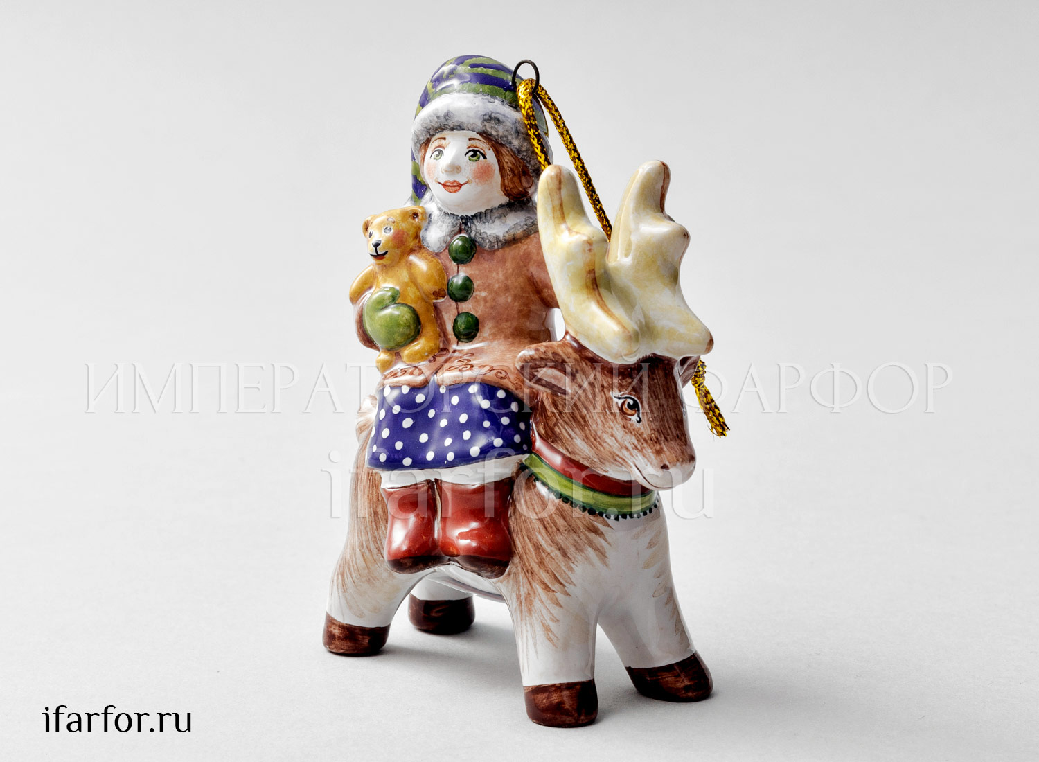 Елочная игрушка «Девочка с мишкой на олене» Форма: Девочка с мишкой на олене. Майолика. 80 x 100 мм.