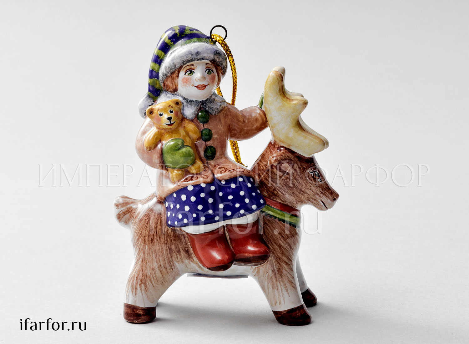 Елочная игрушка «Девочка с мишкой на олене» Форма: Девочка с мишкой на олене. Майолика. 80 x 100 мм.