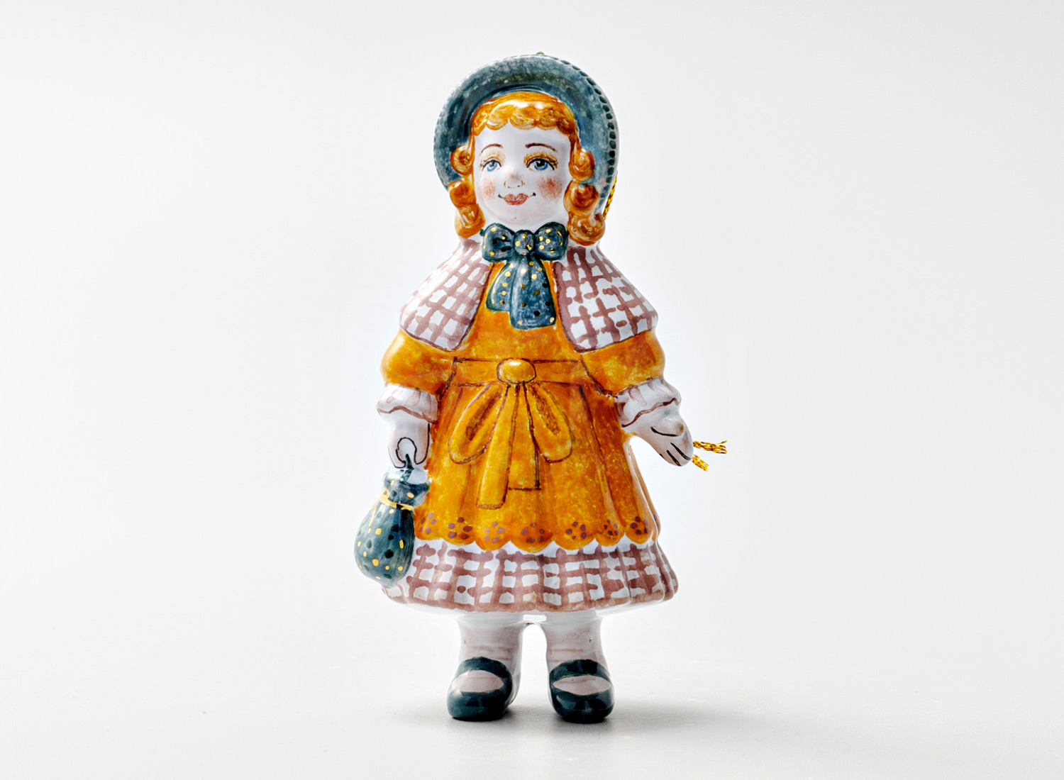 Елочная игрушка «Кукла» Форма: Кукла. Майолика. 57 x 115 мм.