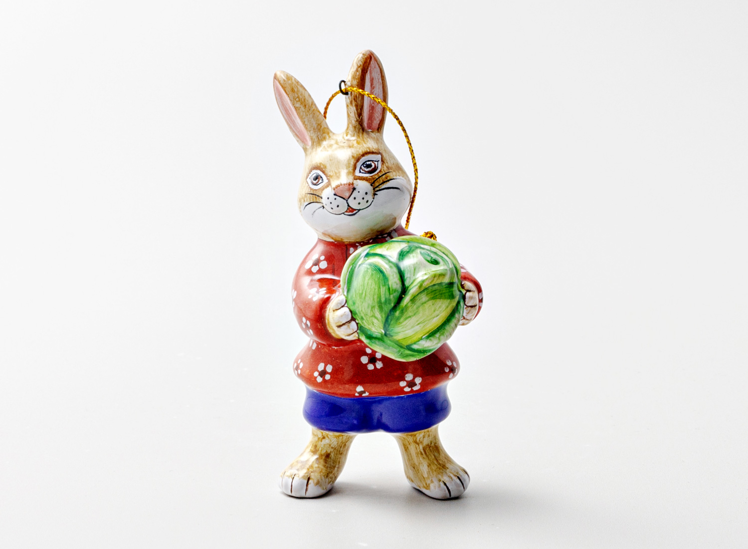 Елочная игрушка «Заяц с капустой» Форма: Заяц с капустой. Майолика. 45 x 45 x 105 мм.
