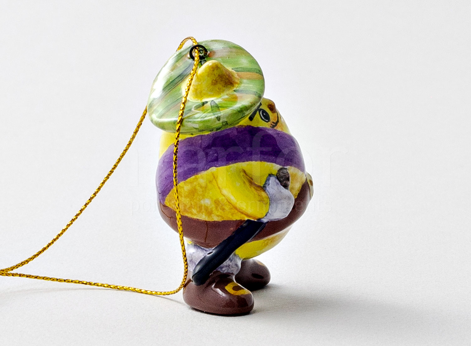 Елочная игрушка «Принц Лимон» Форма: Принц Лимон. Майолика. 65 x 90 мм.