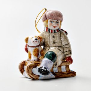 Елочная игрушка Мальчик на санках с собачкой 75 x 93 мм.